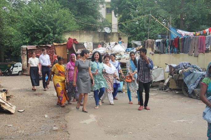 HE Ms Sidhu & Dr Kiran enters Kanak durga slum colony.