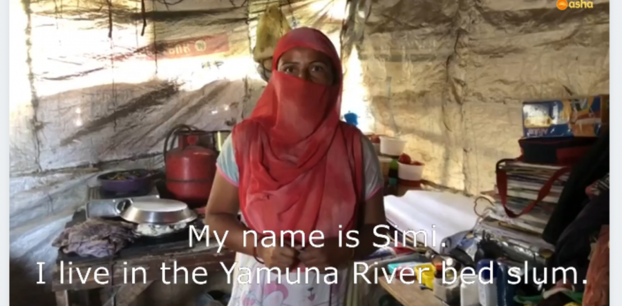 Asha provides aid to slum dwellers by the river bed