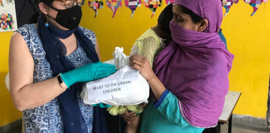 Dr Kiran meets families in Seelampur slum community