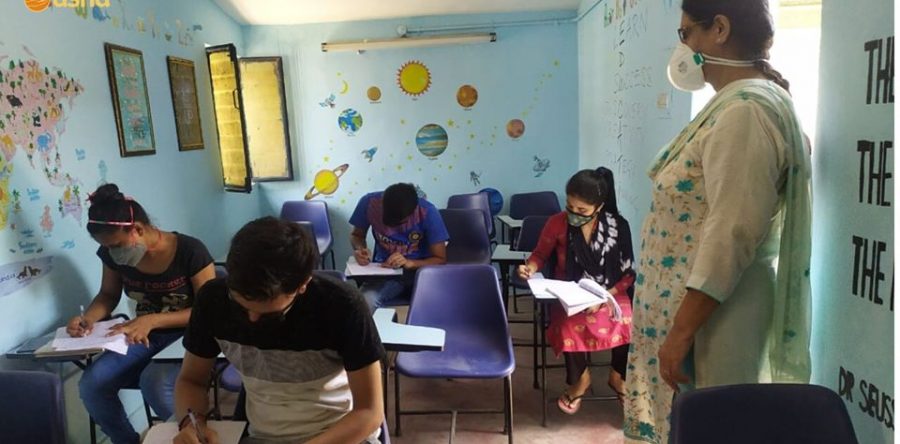 Asha COVID-19 Emergency Response: Asha students prepare to take their online exams at Asha centres