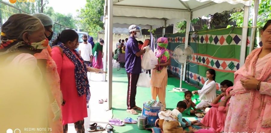 Asha provides relief materials to the poor who lost their homes in Anna Nagar slum