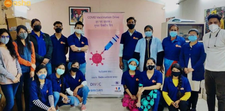 Vaccination to combat Covid-19 in Asha Slum Communities
