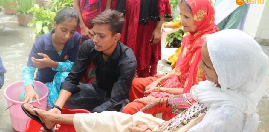 Asha Team and warriors express their love and respect towards the elderly Members from the Community