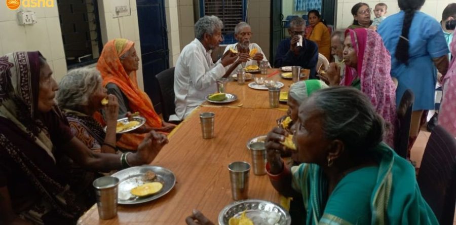 The elderly enjoy nutritious meal at Asha Slum Support Centers