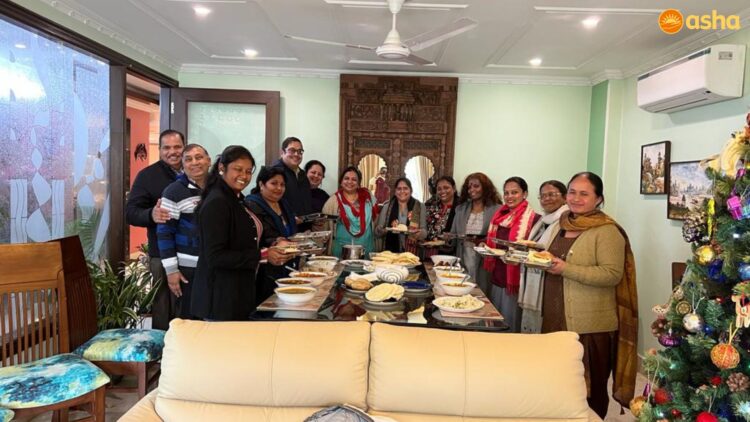 Dr Kiran facilitates the New Year lunch with Asha Team.